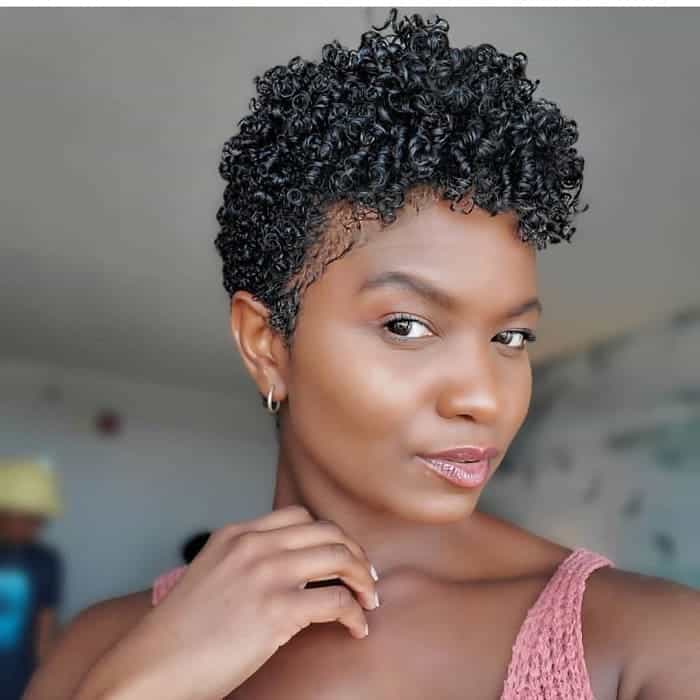 black woman with curly tapered hairstyle