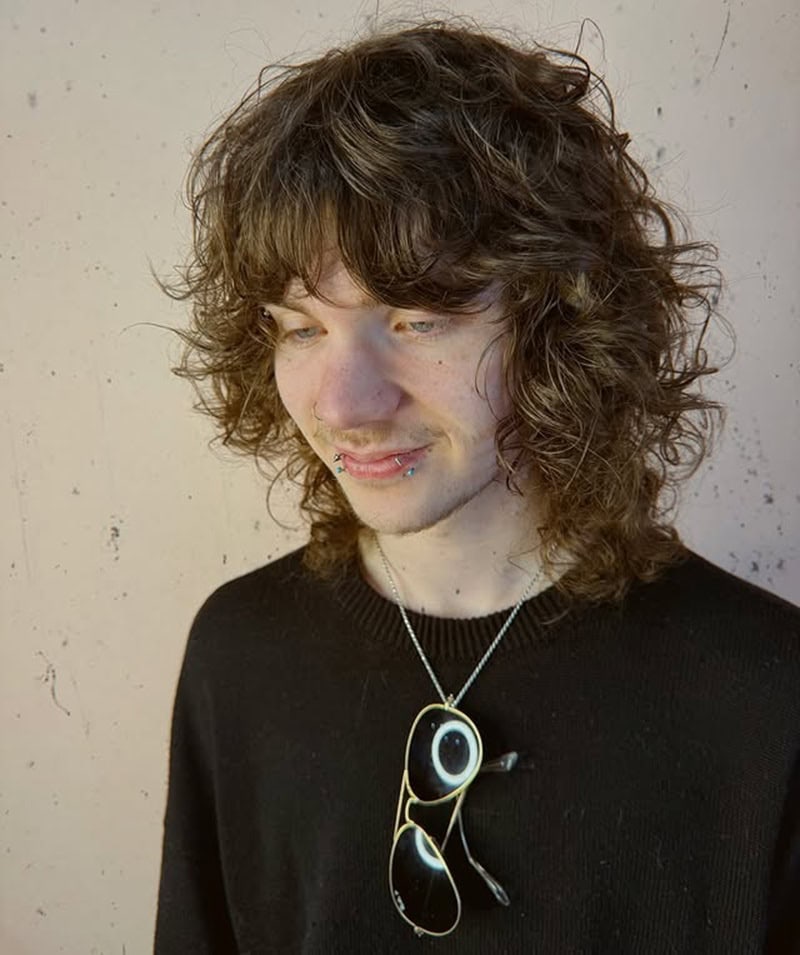 messy long curly shag cut and fringe