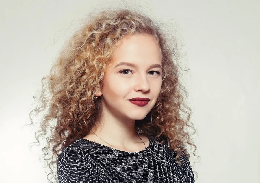 teen girl with spiral perm hairstyle