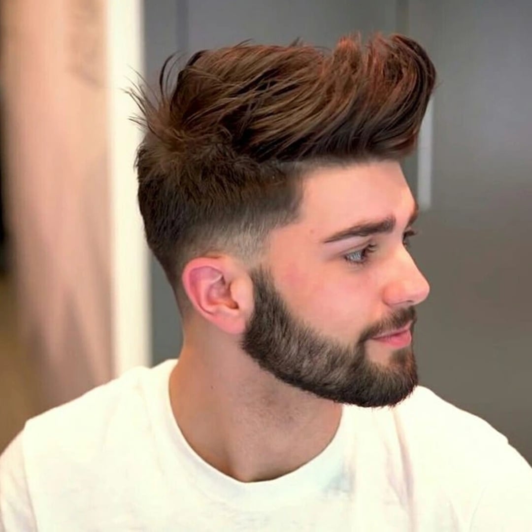 voluminous textured quiff haircut for medium hair