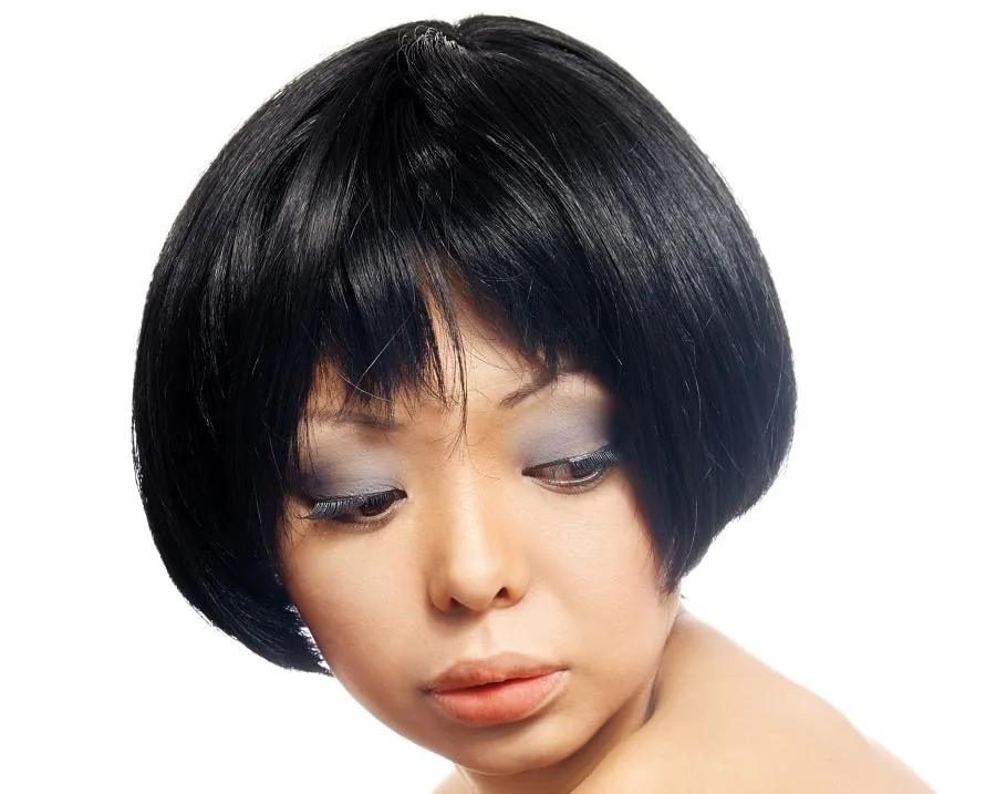 thick French bob with bangs