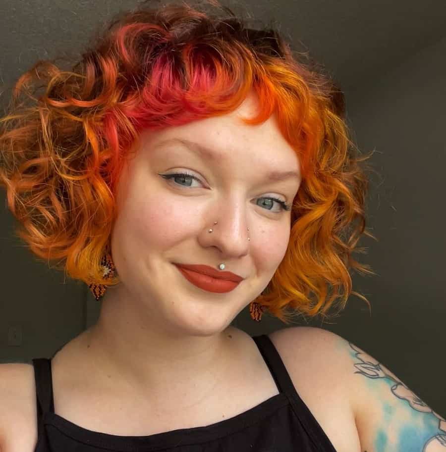 thick curly bob with bangs