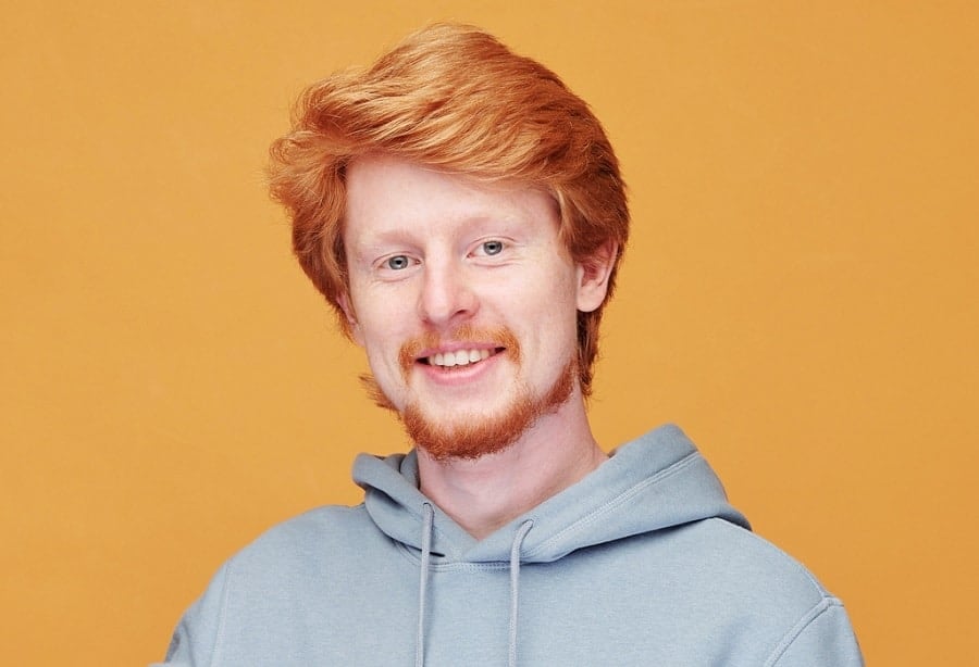 thick ginger red hairstyle for men
