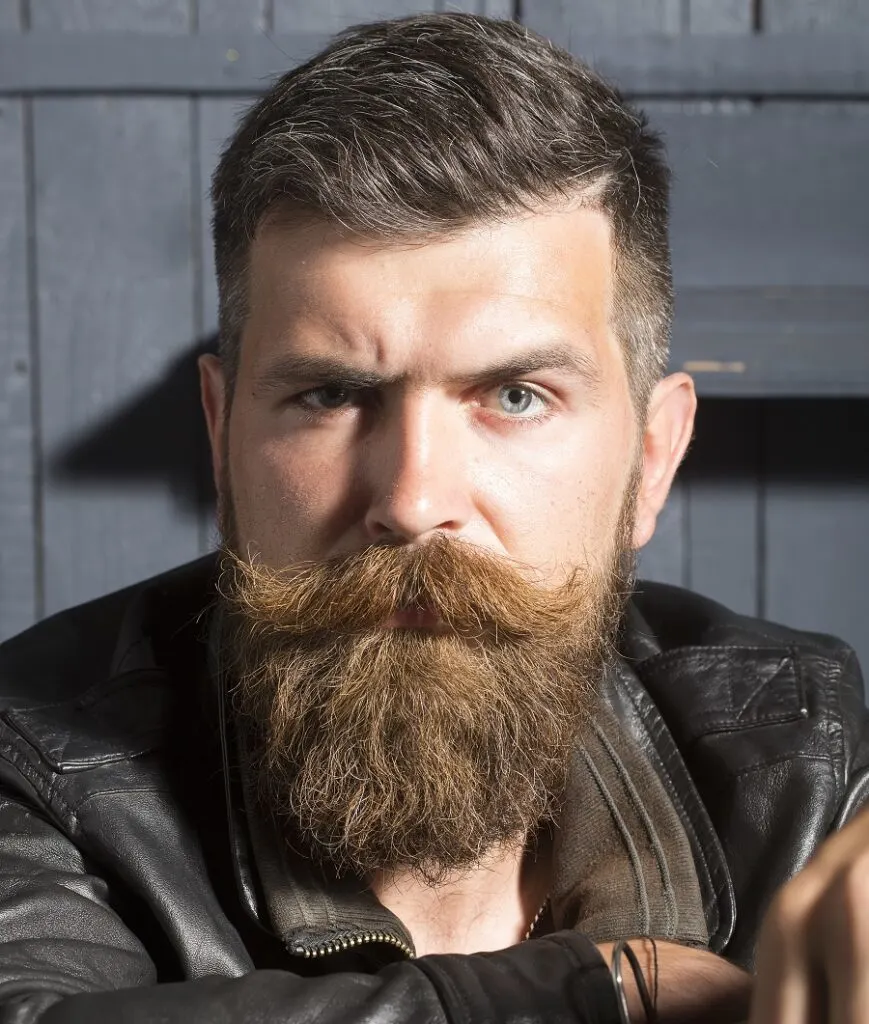 thick handlebar mustache with hipster beard
