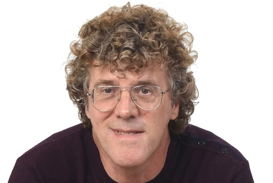 tight perm hairstyle for older men