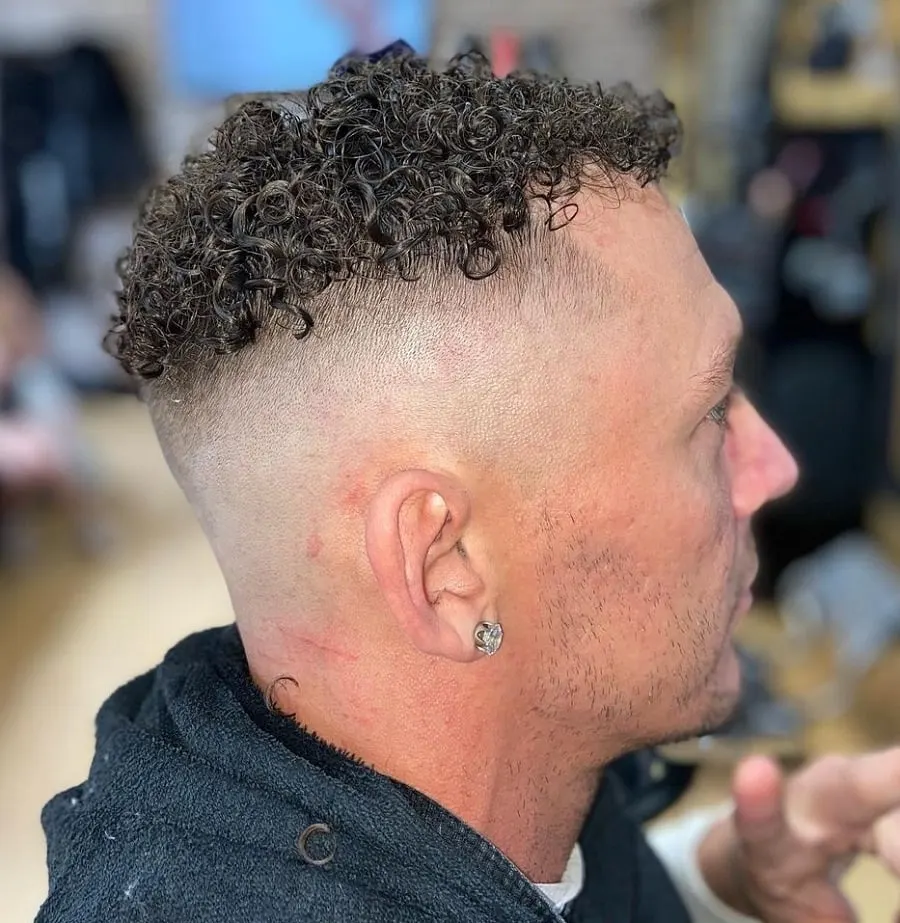 tight perm with bald fade