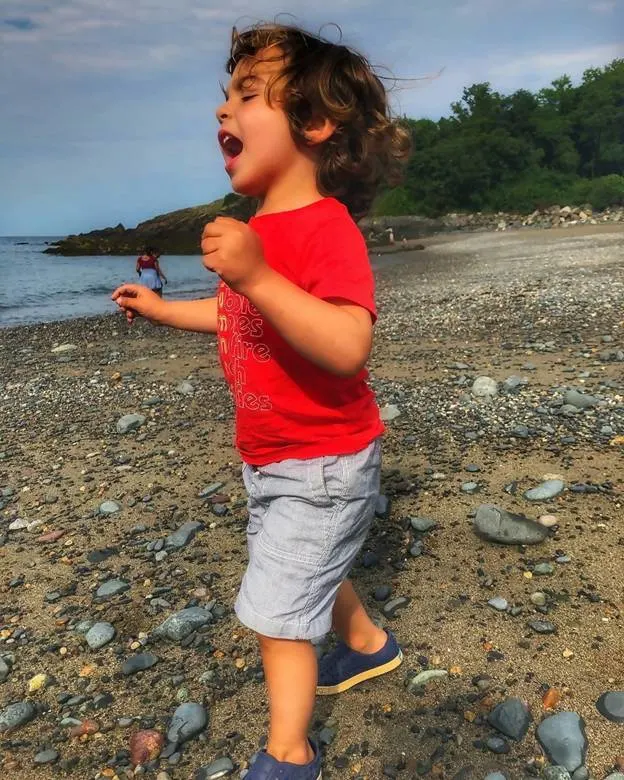 toddler boy with long wavy hair