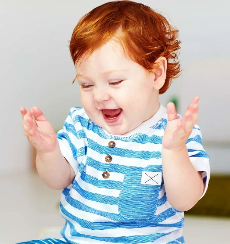 toddler boy with short copper hair