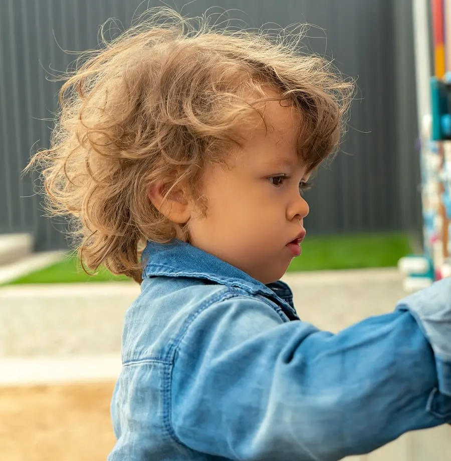 toddler boy's messy long hair