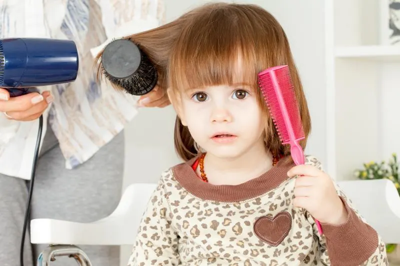 Happy Girl Getting Her Hair Cut A Series Of Photos Of A Girl Getting Her Hair  Cut Haircut Girl Stock Photo Picture And Royalty Free Image Image  166578087