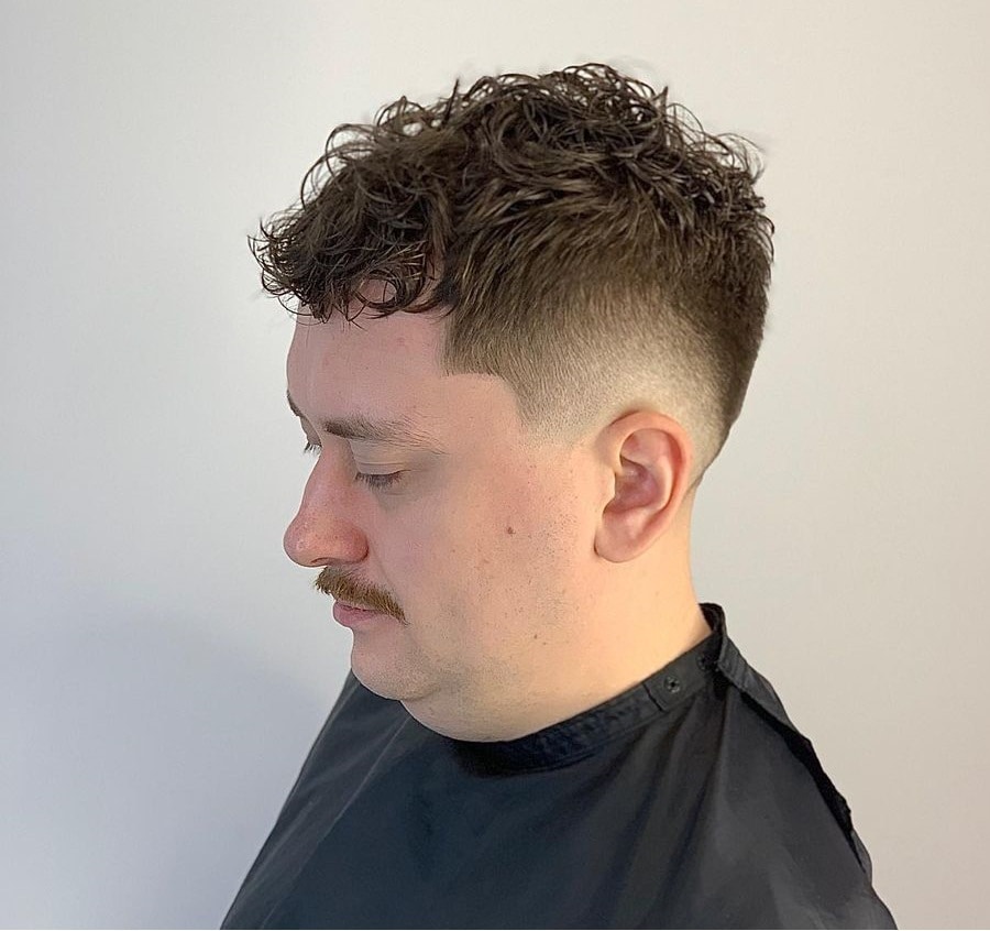 tousled hair with fade for men