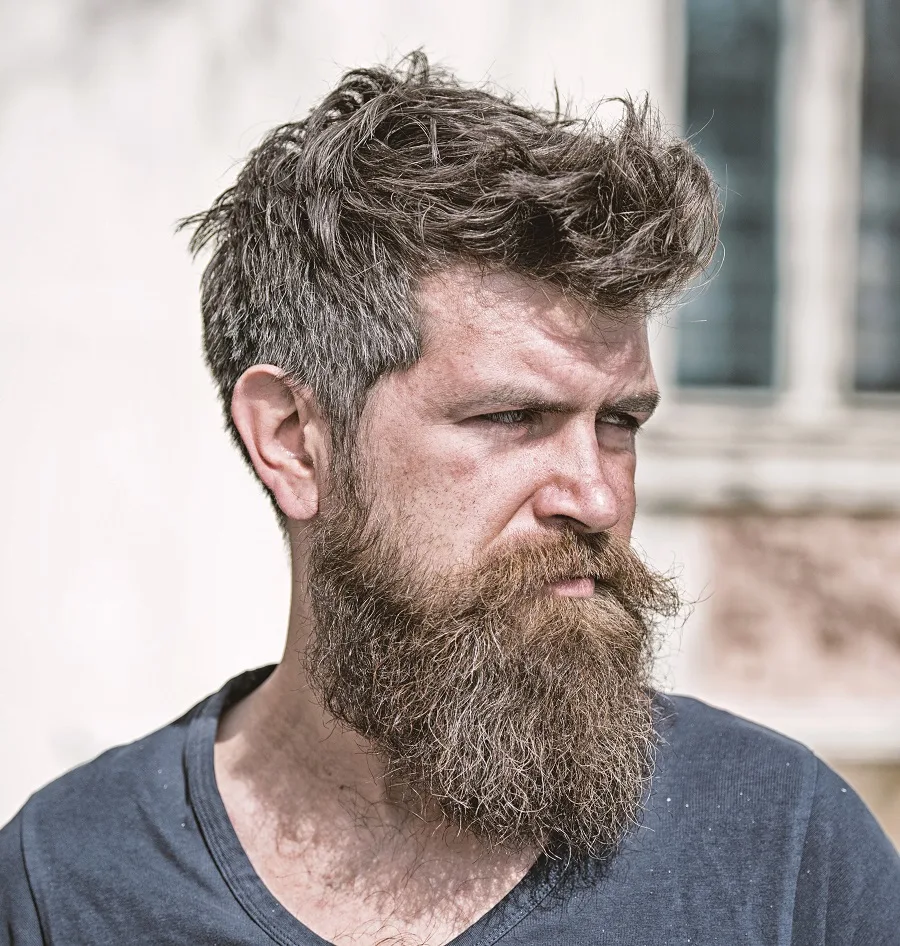 tousled hairstyle with beard