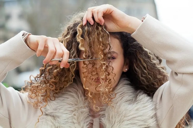 Trimming curly, multi-textured hair with shears