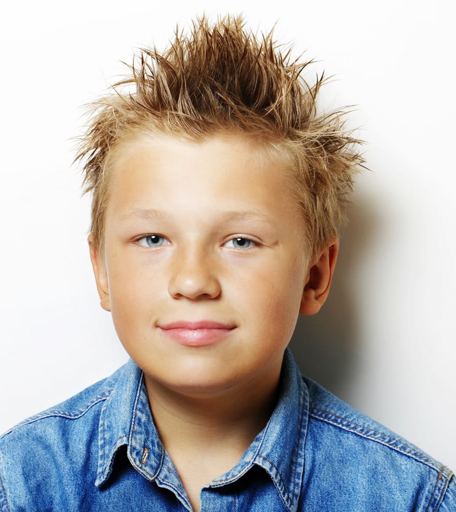 tween boy with spiky hairstyle