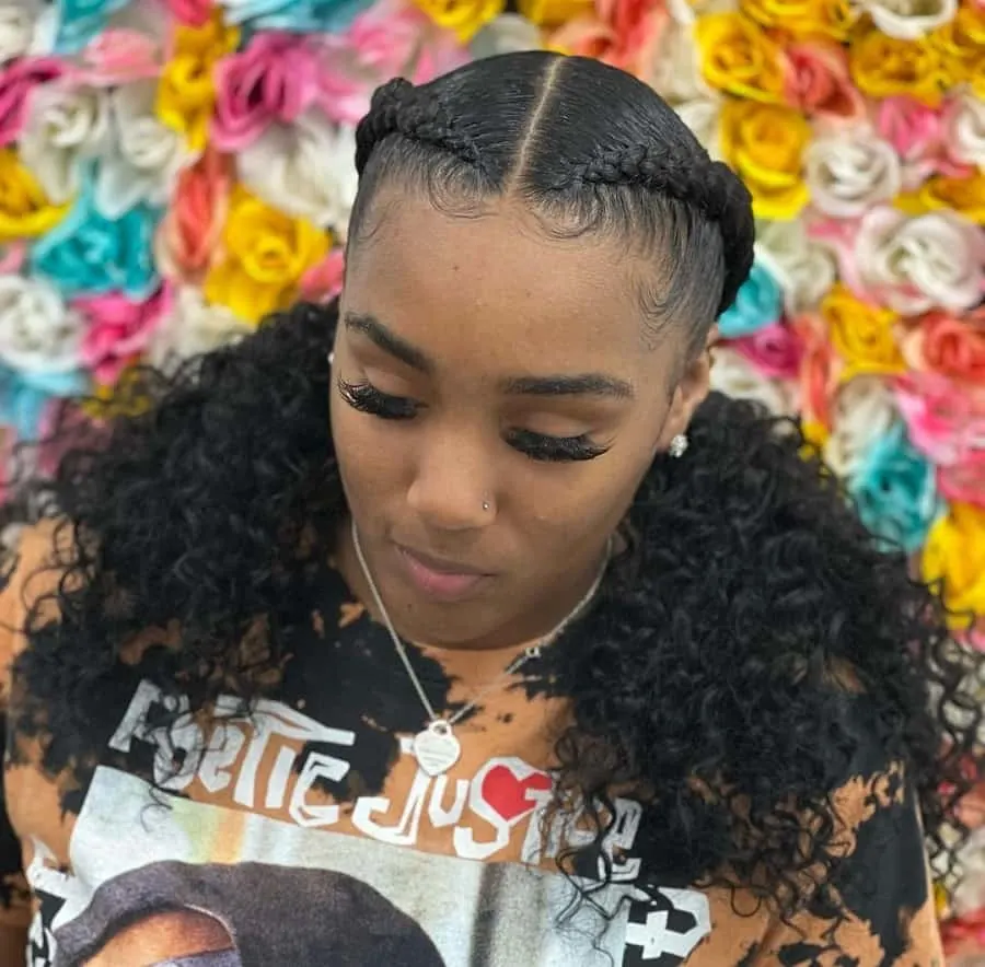 two big weave braids with curls