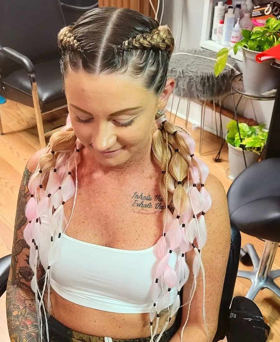 two feed in braids with middle part
