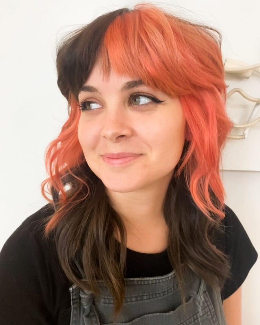 Two tone wavy hair with curtain bangs