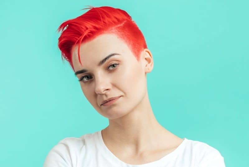 undercut pixie with bright red color