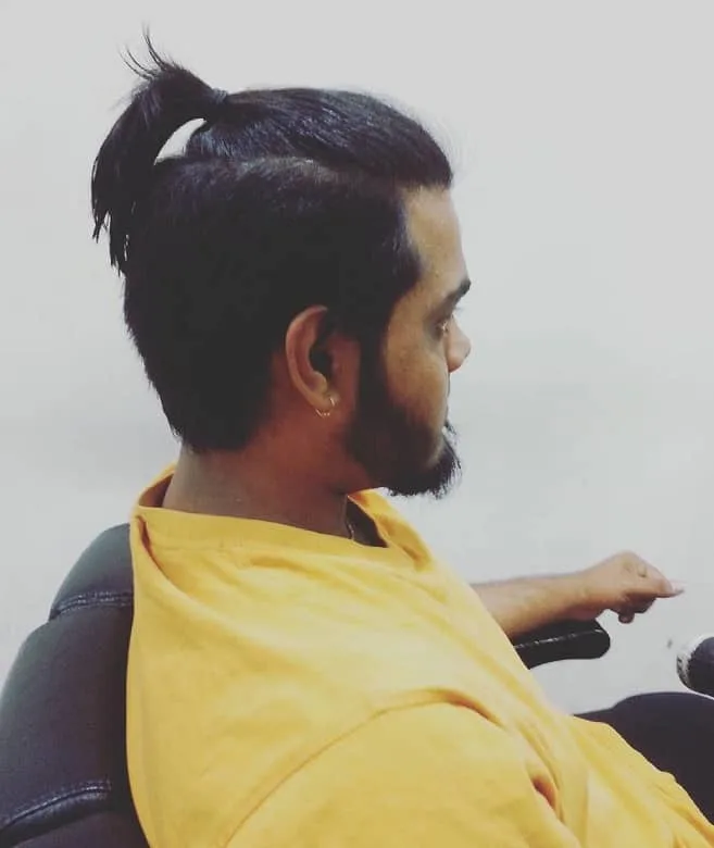 guy with undercut ponytail