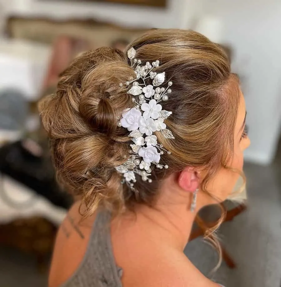 updo with caramel balayage hair