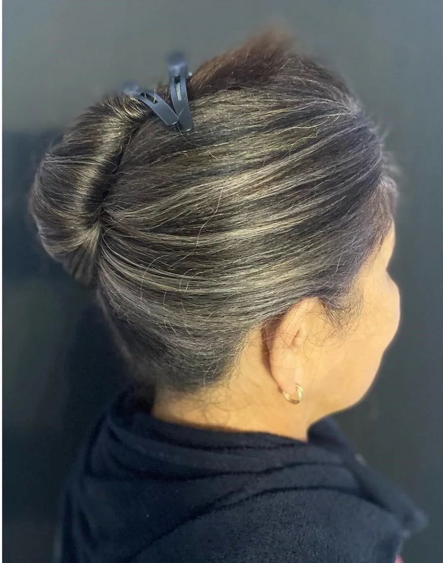 updo with grey highlights