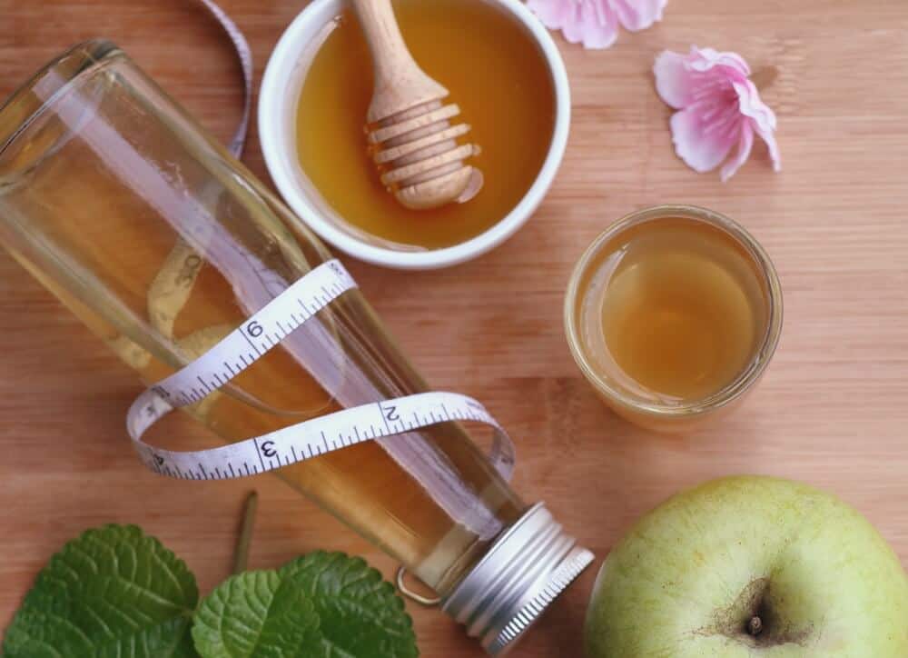 use apple cider vinegar with honey to lighten hair naturally