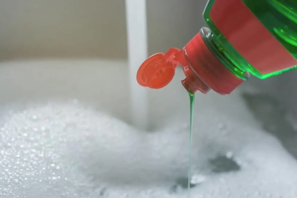 use dish soap to remove hair glue