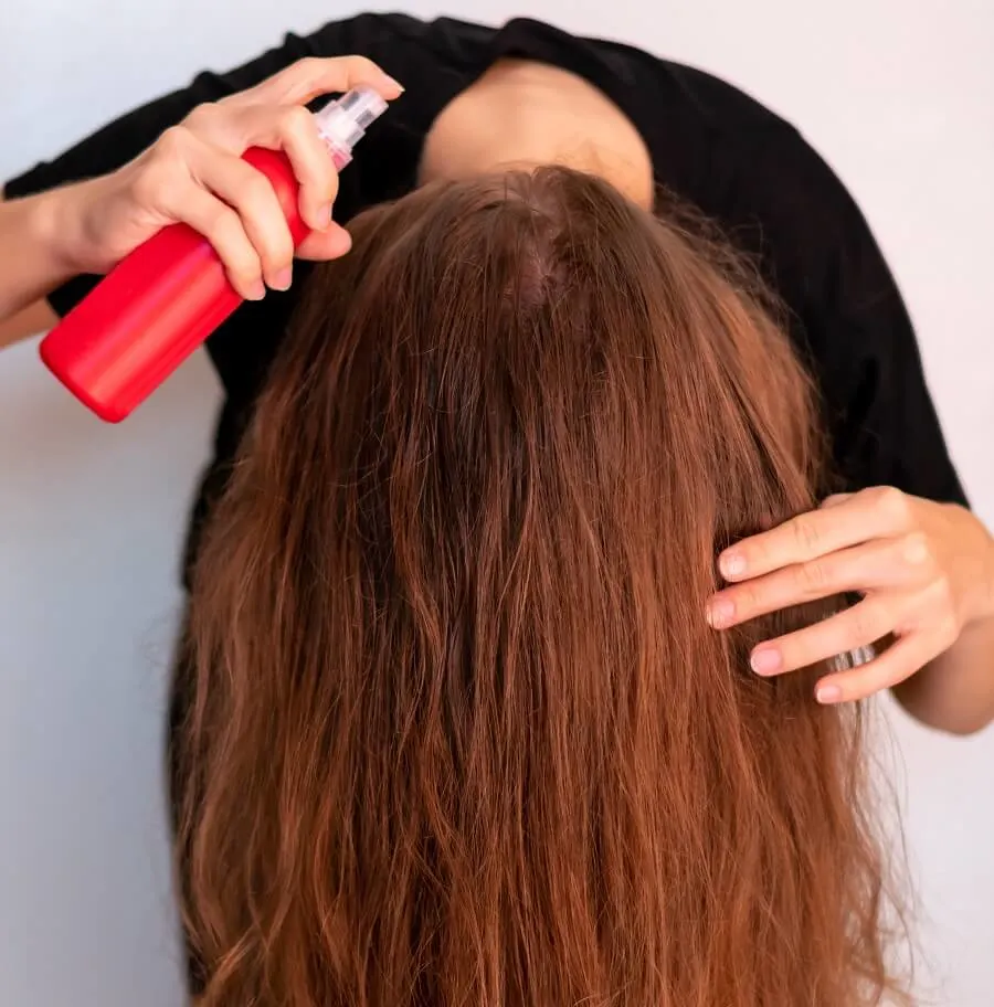 use hair sunscreen to protect hair color from fading