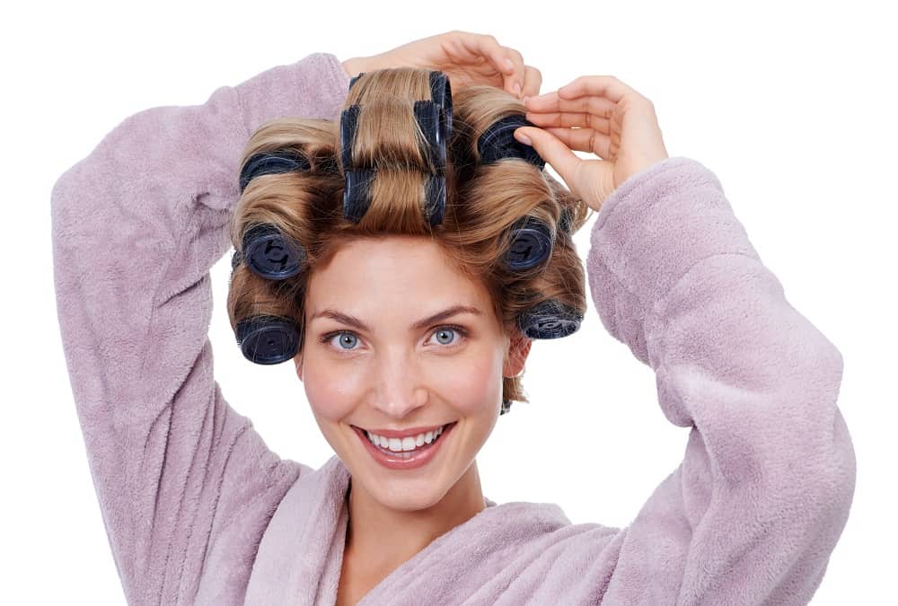 use hot rollers on curly hair to get volume