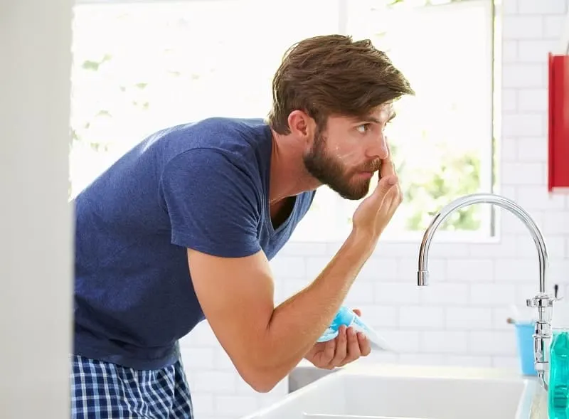 men grooming with mustache wax