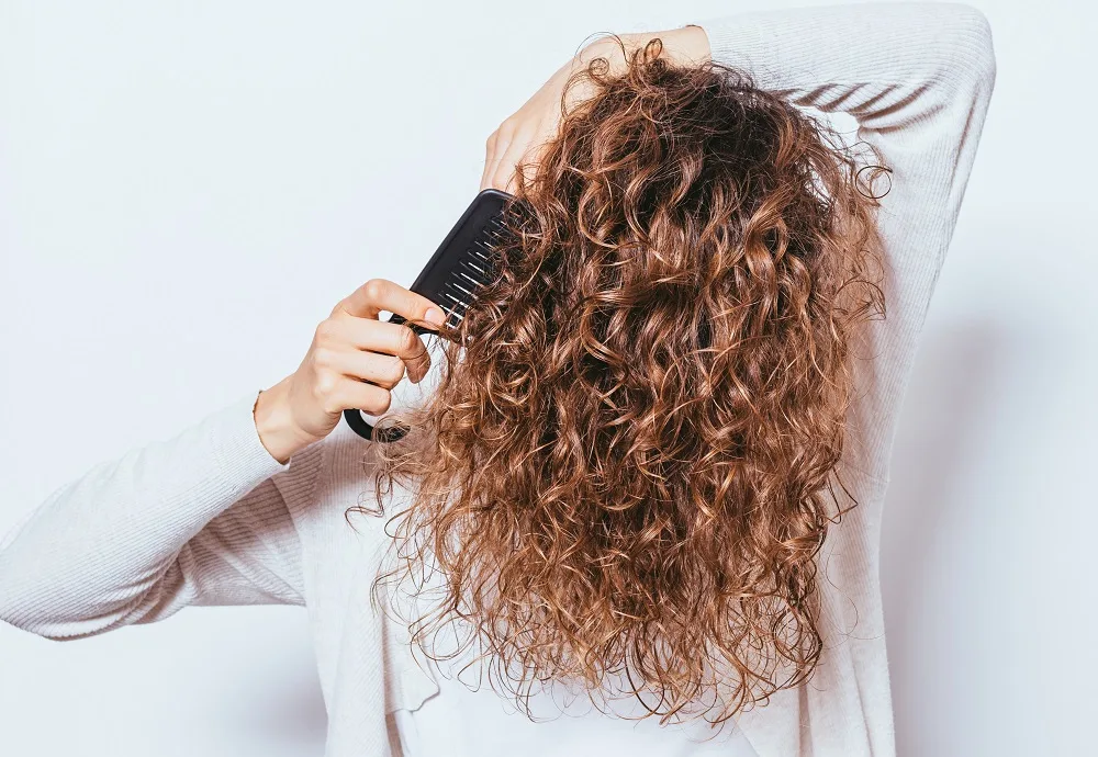 using wide tooth comb for curly hair