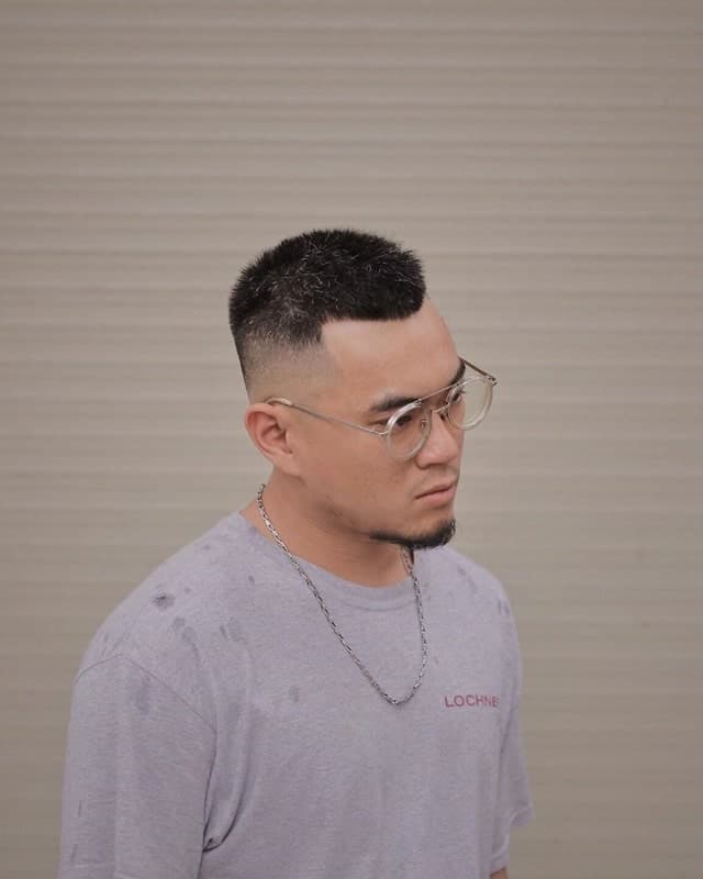 guy with very short hairstyle