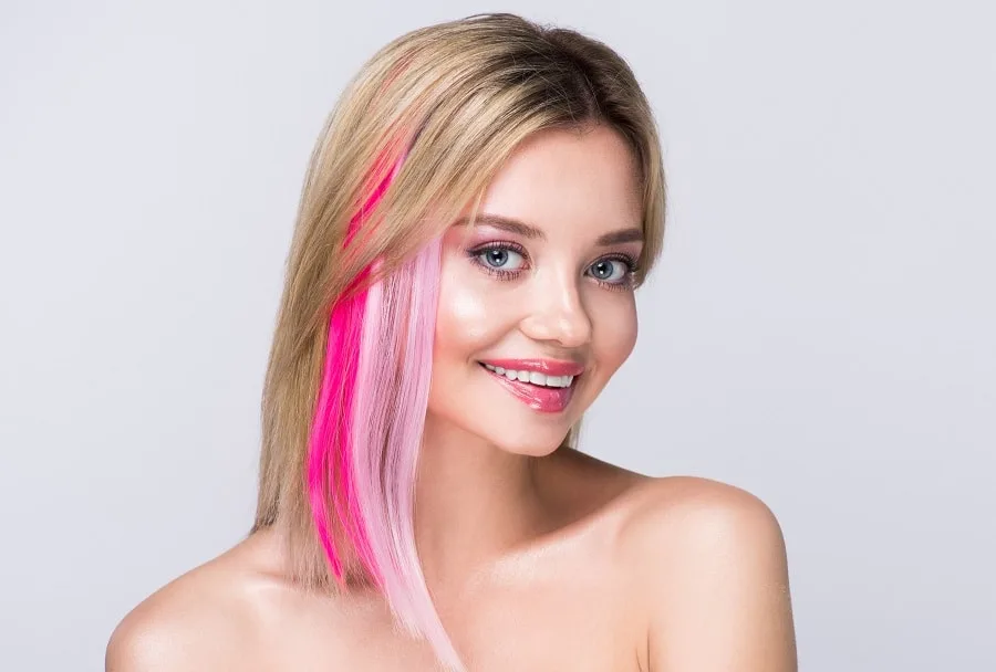 warm blonde hair with pink streaks