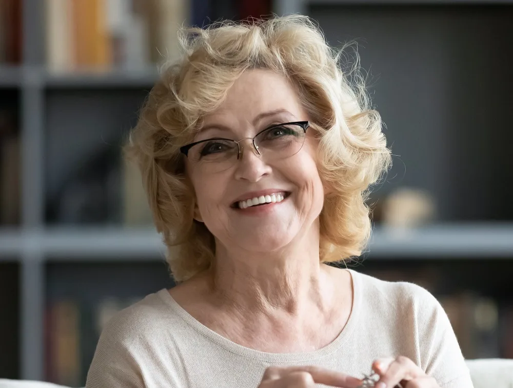wavy bob for over 60 women with glasses