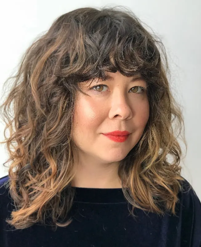 wavy hair and bangs for round face