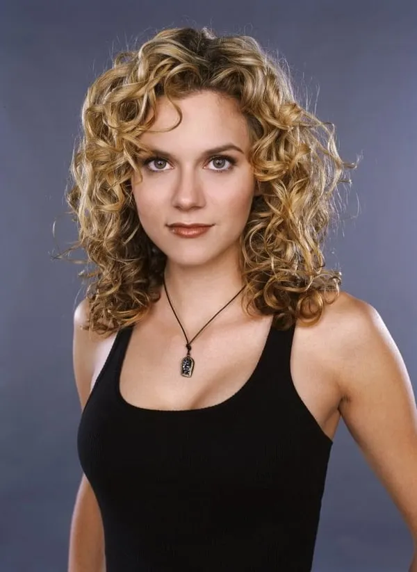 tight curled perm hairstyle