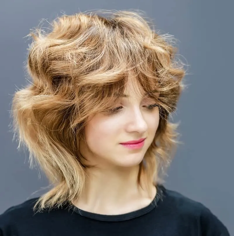 wavy hair with Bardot bangs