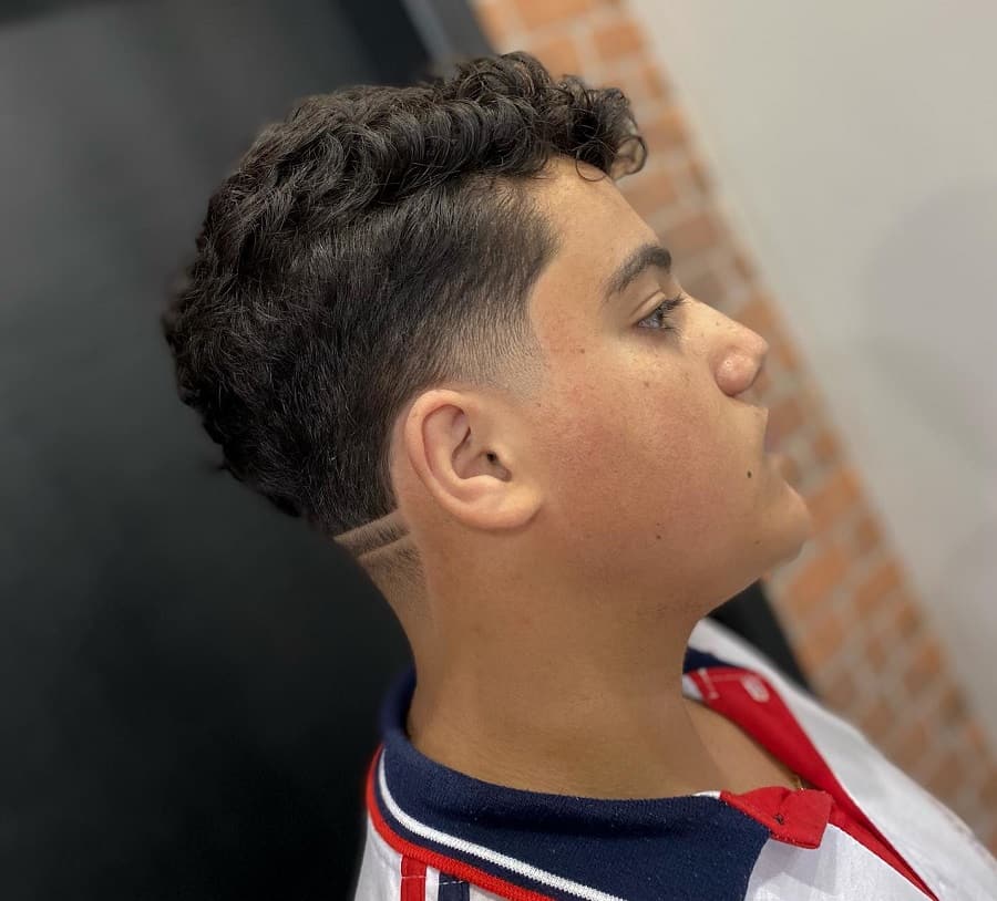 wavy haircut with taper fade