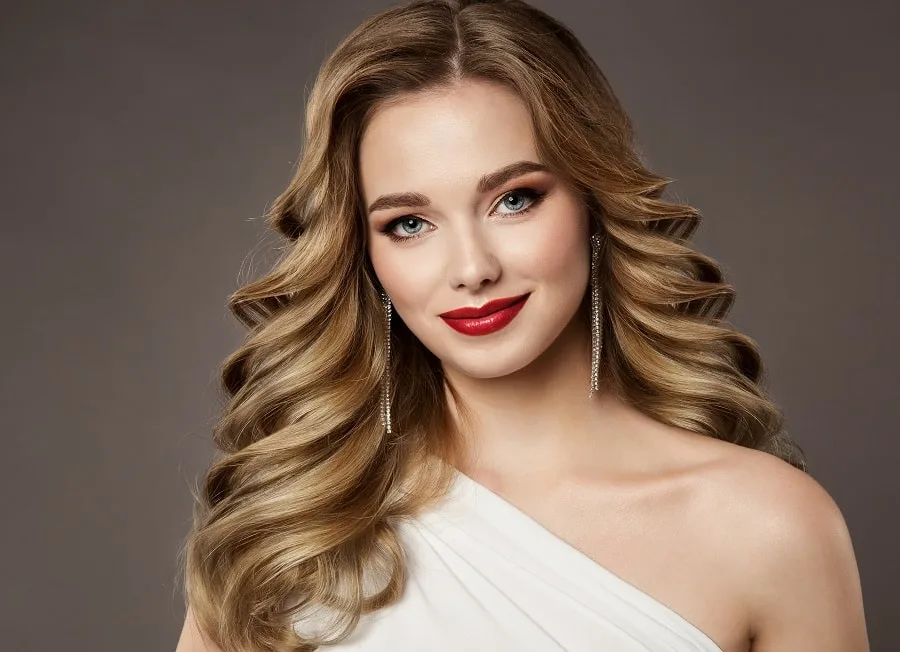 wavy hairstyle for one shoulder wedding dress