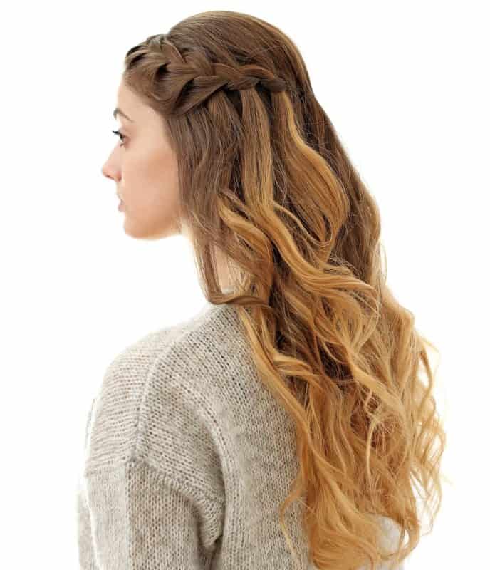 wavy half up half down braided hairstyle