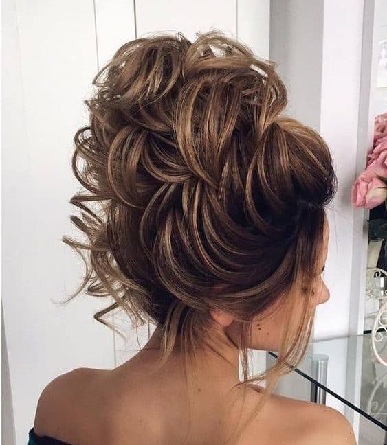 messy bun with weave
