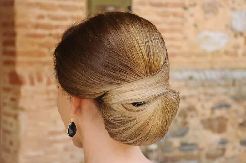 sleeking low wedding bun for women