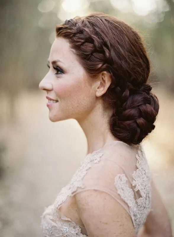 Side Braided Low Bun Wedding hairdo