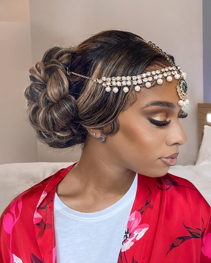 black bride with highlighted twisted wedding bun 