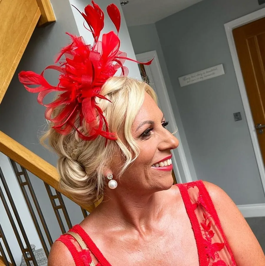 wedding guest hairstyle with fascinator over 50