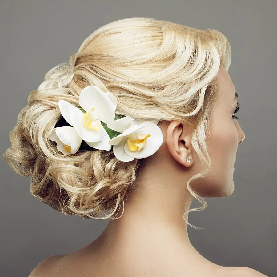 wedding hair bun with flowers