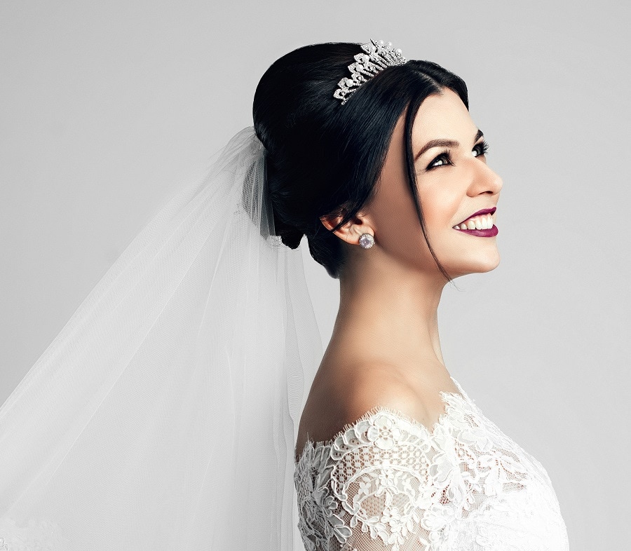 wedding hair bun with tiara and veil