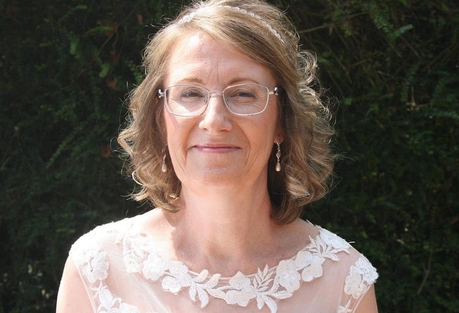 wedding hairstyle for bride over 50 with glasses