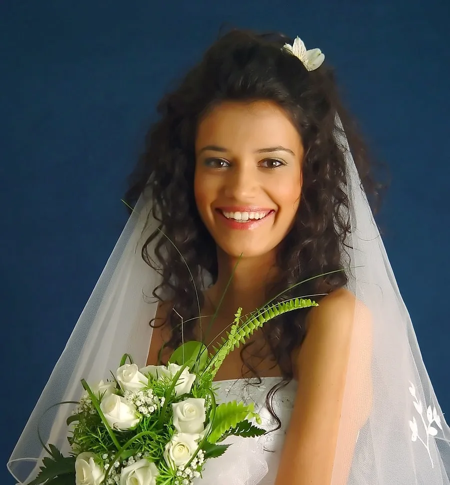 wedding hairstyle with flowers and veil