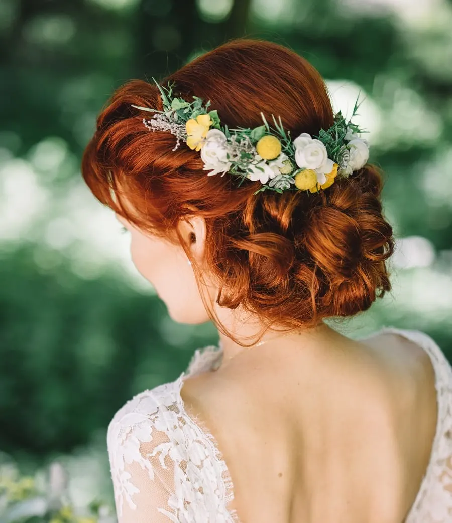 wedding hairstyle with flowers for redheads